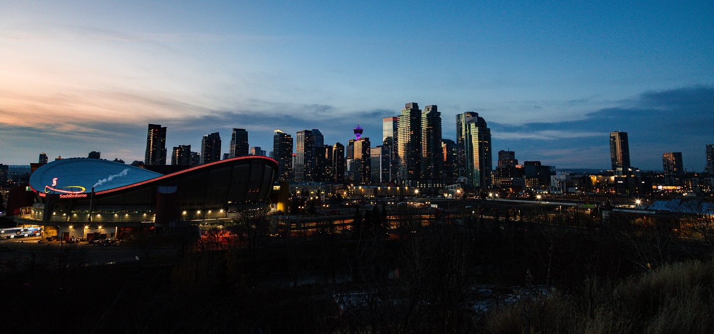Alberta landscape with modern web design elements and innovation symbols
